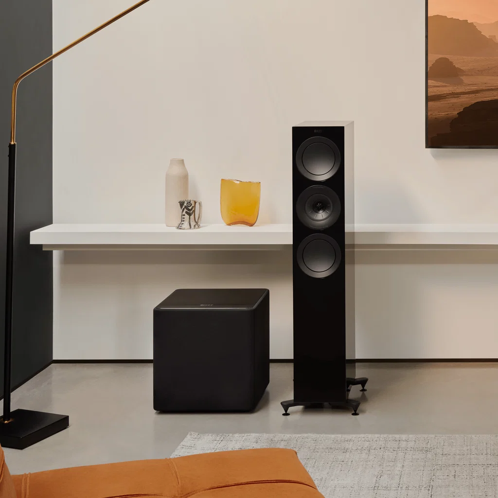 KEF Kube 12 MIE Black subwoofer placed in a home theatre setup