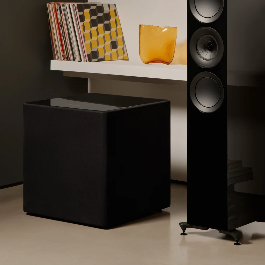 KEF Kube 15 MIE Black subwoofer placed in a dedicated home theatre